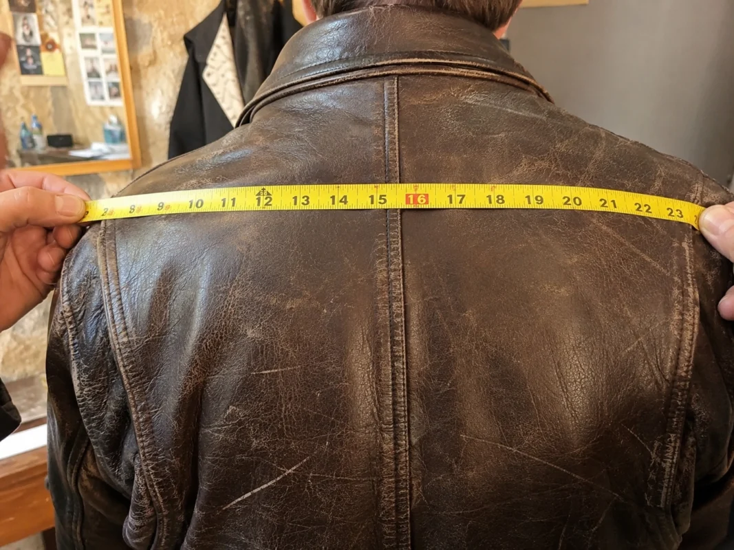 Leather jacket with measuring tape